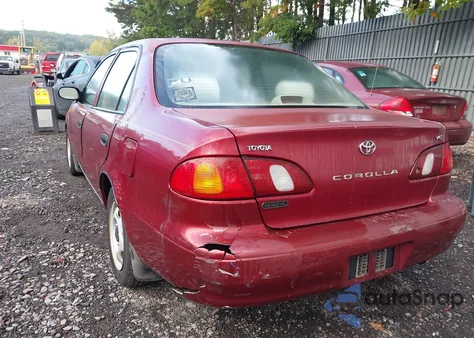 1999 Toyota Corolla Ve from USA, damaged, VIN 2T1BR12E9XC217768